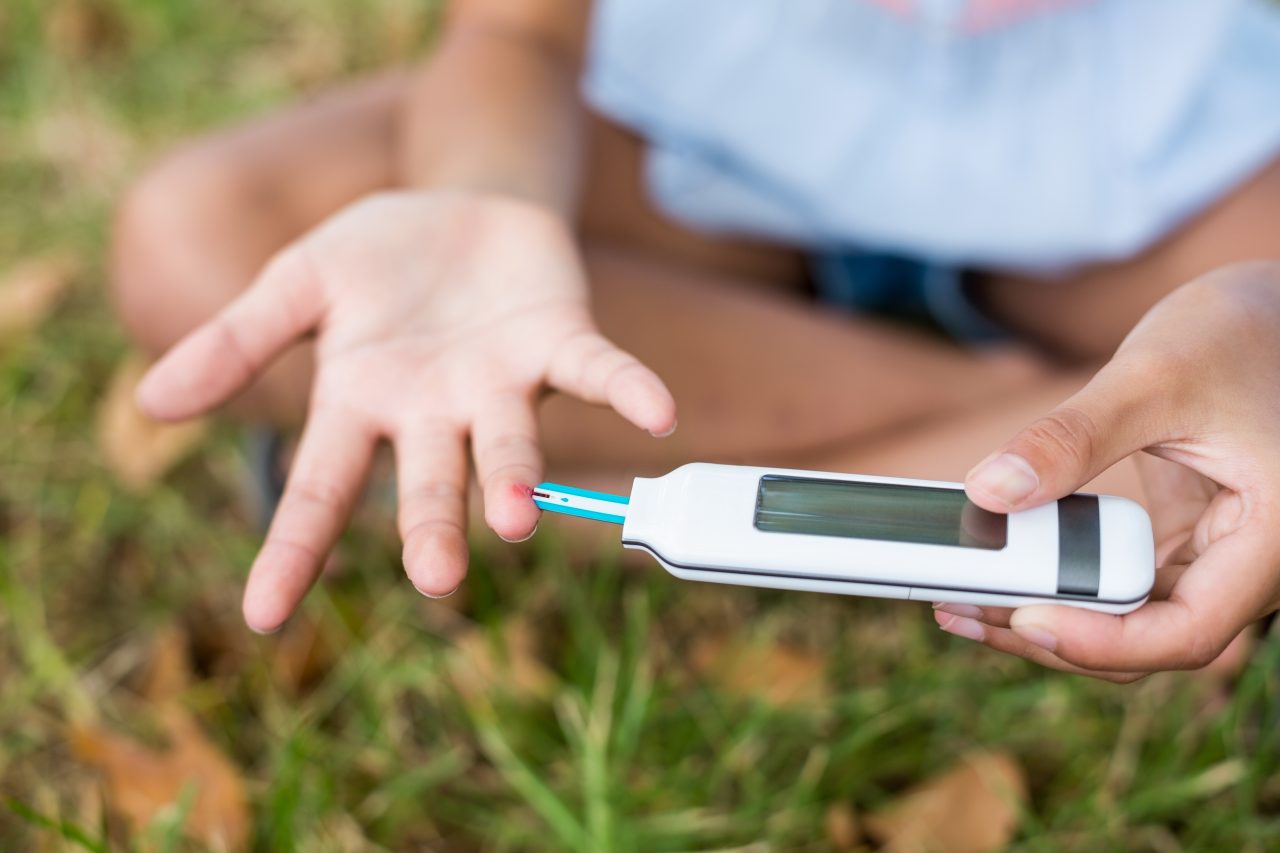 girl-testing-diabetes-on-glucose-meter-2021-08-28-18-10-05-utc-1280x853.jpg